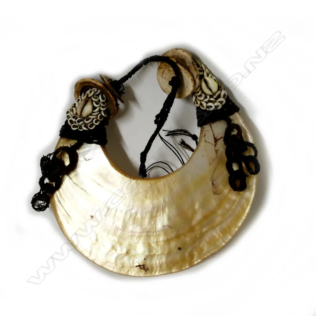 A Papua New Guinea pearl shell crescent breast plate Image 1++