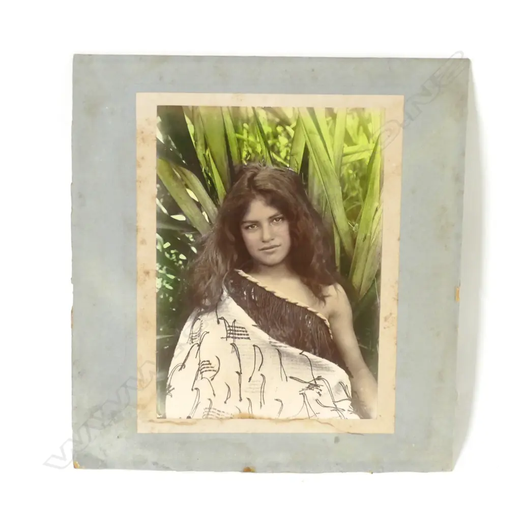 An early 20thC hand coloured photo of a young Maori girl Image 1++