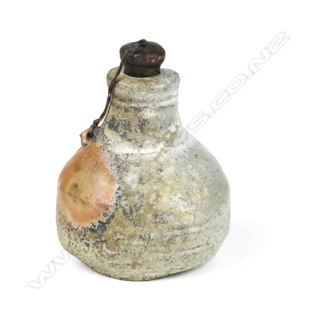 A good small Chester Nealie pottery flask of baluster shape with central lug and original cork stopper Image 1++