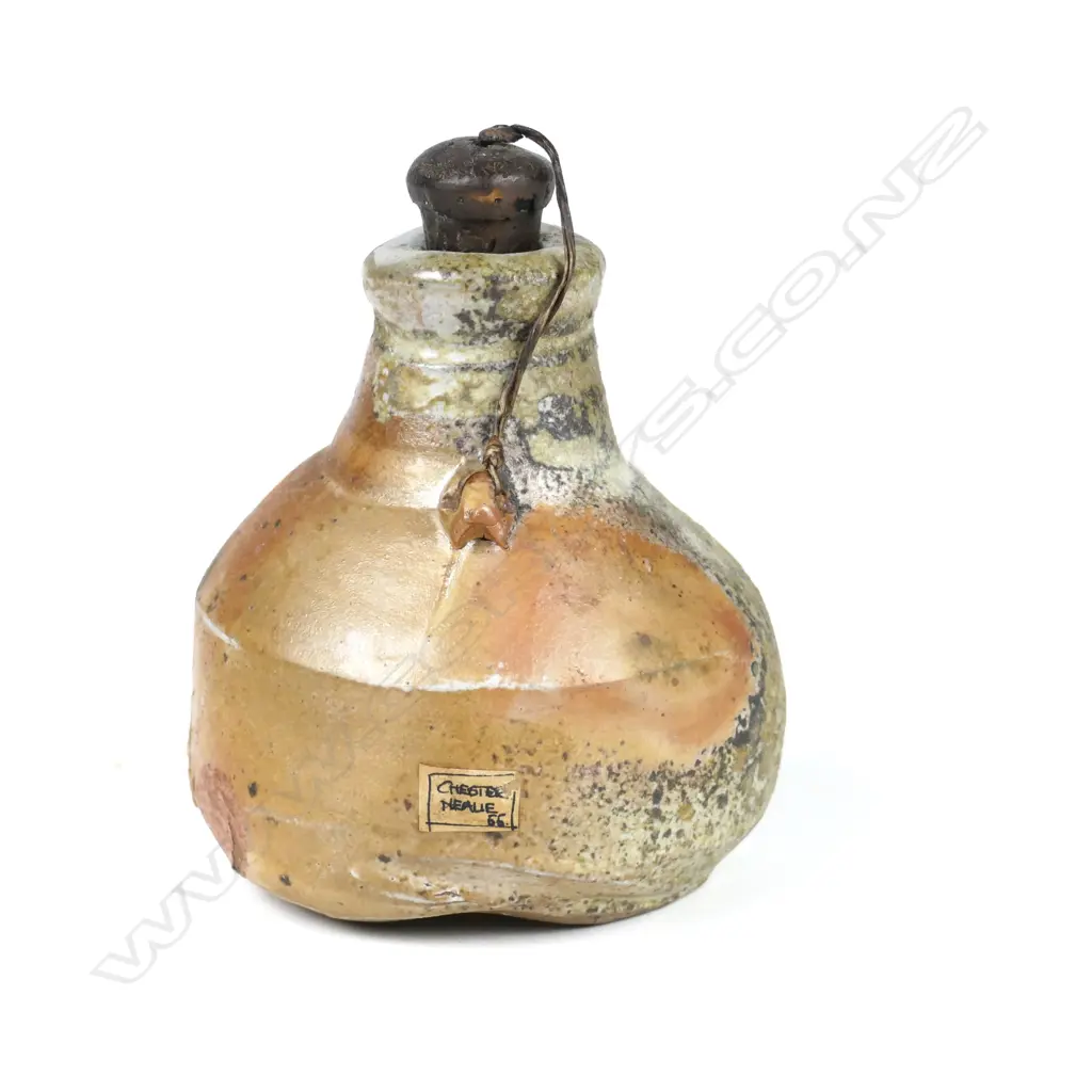 A good small Chester Nealie pottery flask of baluster shape with central lug and original cork stopper Image 1++