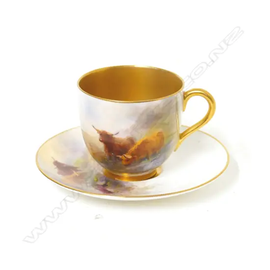 A Royal Worcester demitasse cup and saucer