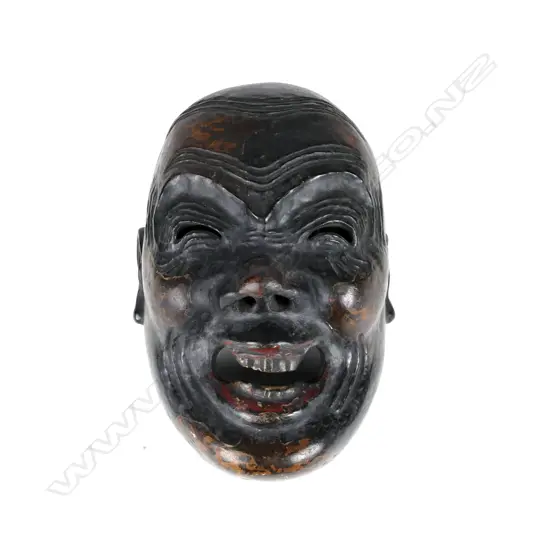 An antique Japanese Bugaku mask