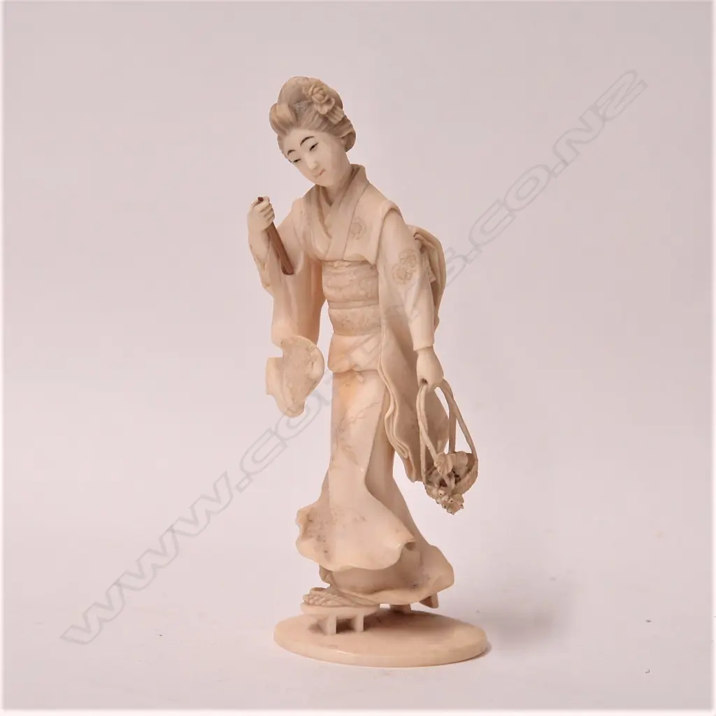A Japanese carved ivory okimono Image 1++