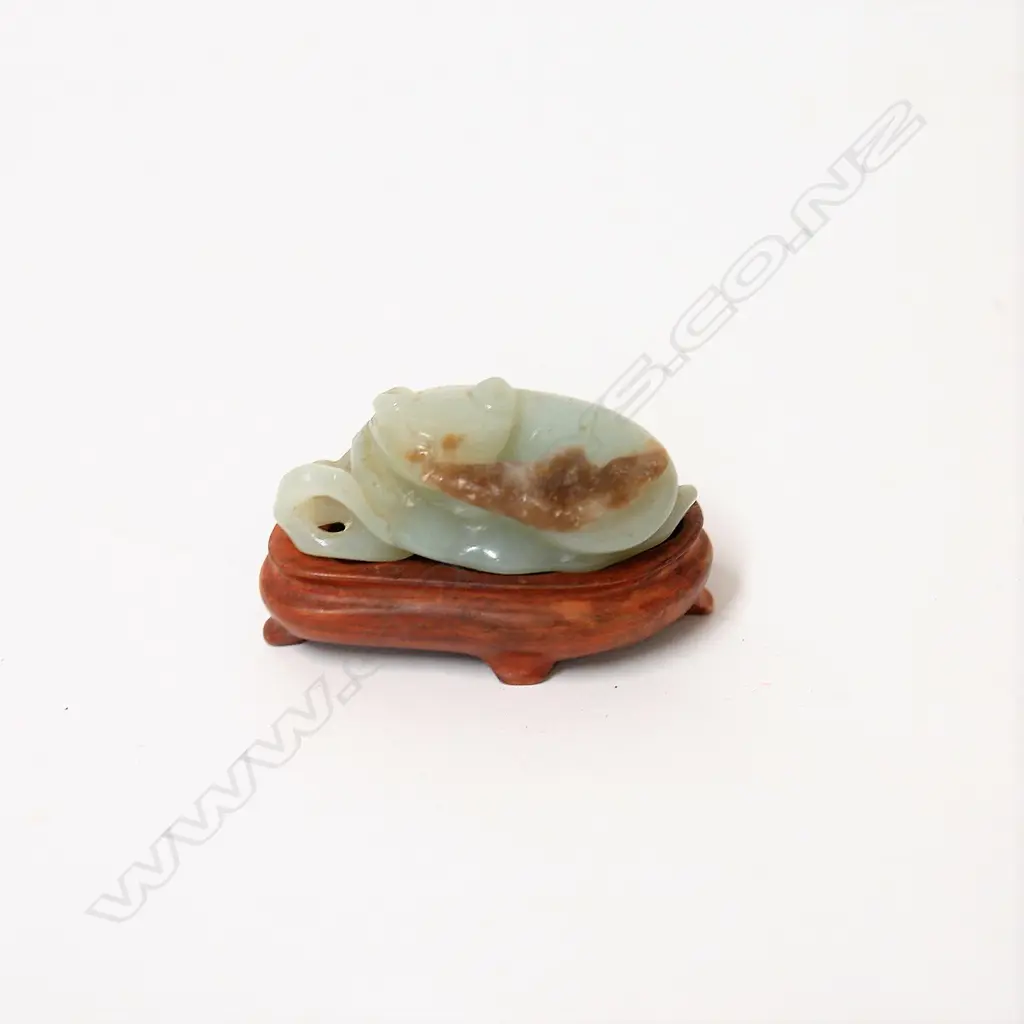A Chinese pale green and dark jade cat with bat on leaf Image 1++