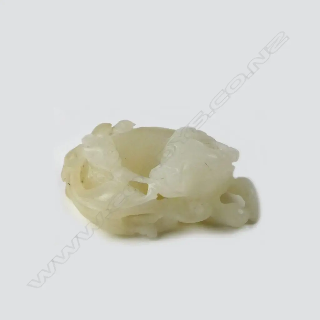 A small mutton fat jade carved piece Image 1++