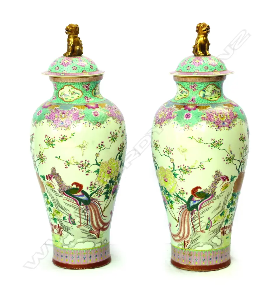 A pair of famille rose lidded floor vases Image 1++