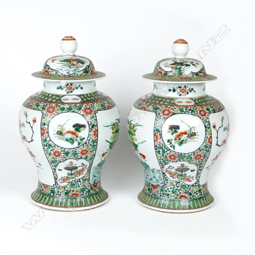 A pair of large Chinese lidded famille verte baluster vases painted with panels of birds Image 1++