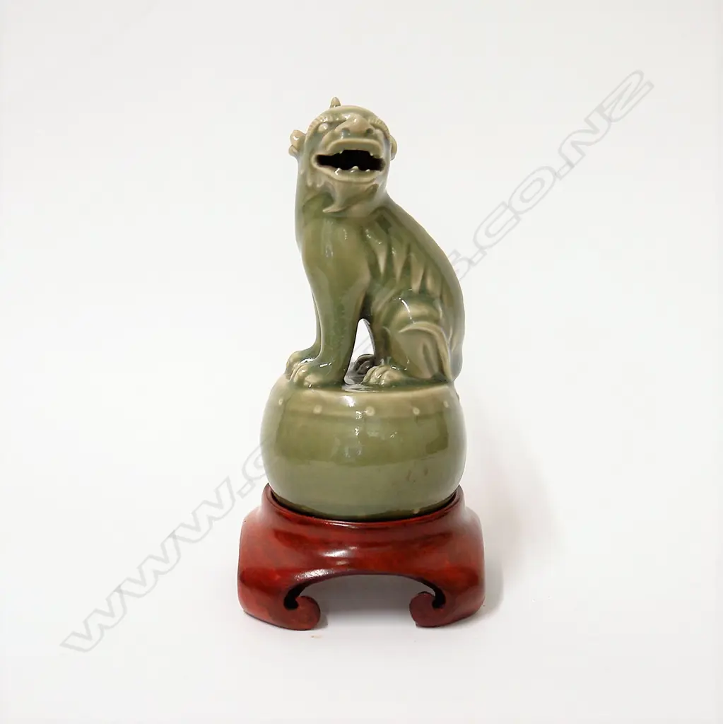 An old celadon seated Kylin Image 1++
