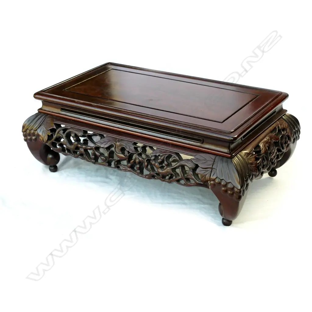 A small low Chinese hardwood vase stand Image 1++