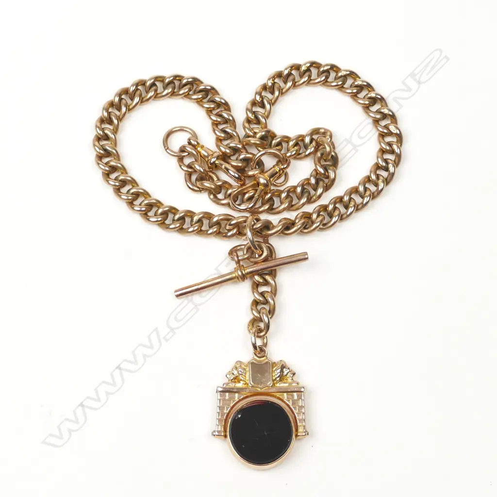 An Edwardian 9ct. gold curb link fob chain Image 1++