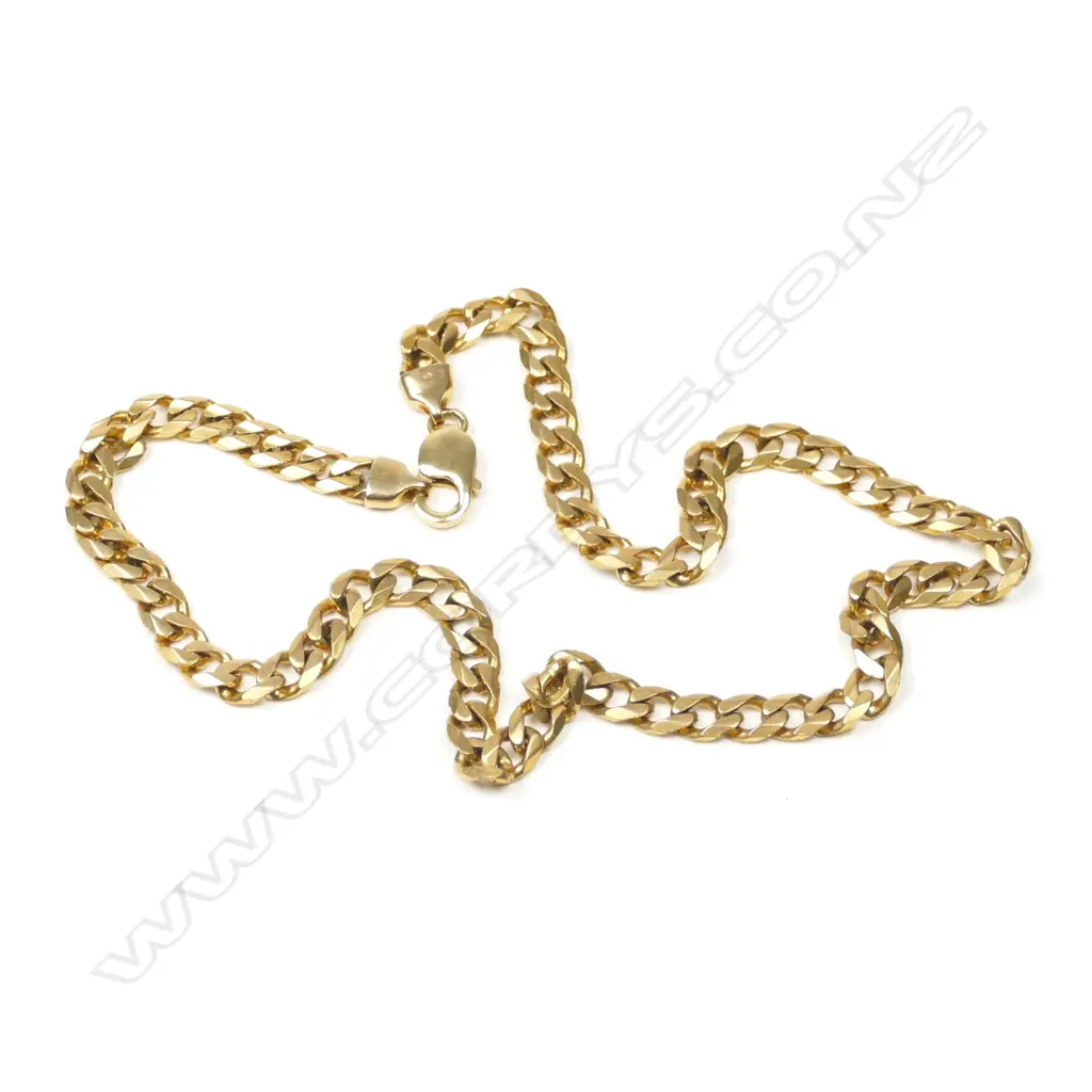 A modern 9ct. yellow gold flat curb link chain Image 1++