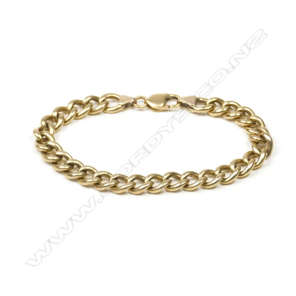 A 9ct. yellow gold curb link bracelet Image 1++