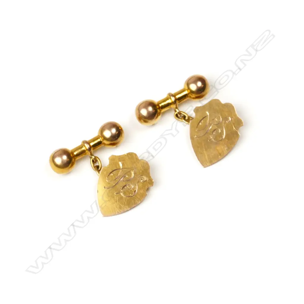 A pair of 9ct. gold cuff links Image 1++