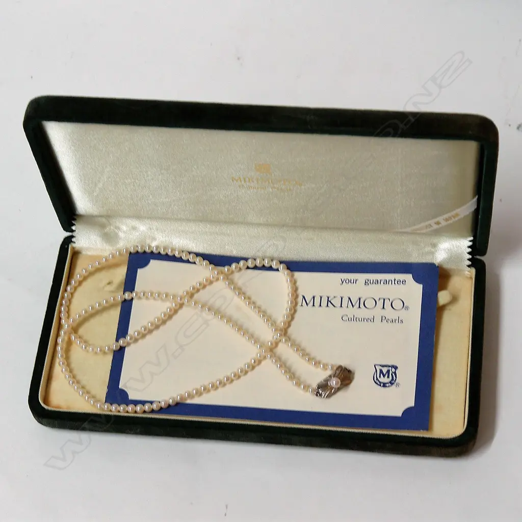 A vintage string of Japanese Mikimoto cultured pearls Image 1++