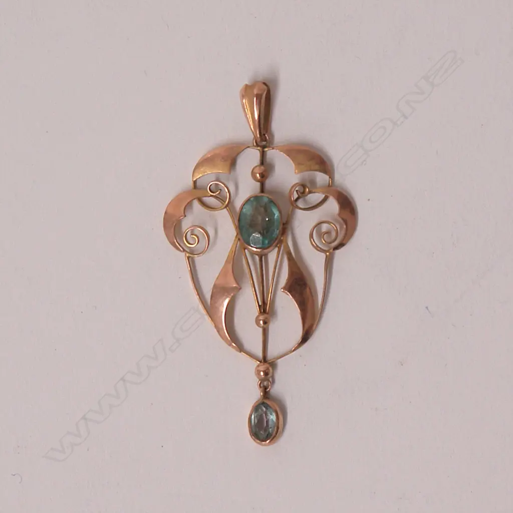 An Art Nouveau 9ct. rose gold and topaz set pendant Image 1++