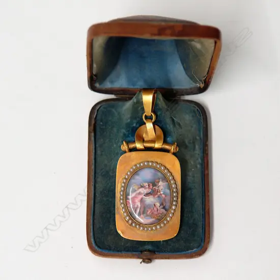 A late 19thC impressive boxed 18ct. gilded yellow gold enamelled panel and seed pearl pendant