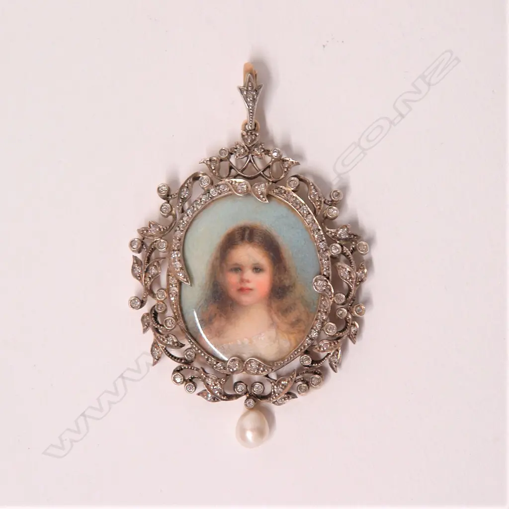 A quality 19thC gold diamond and pearl framed hand painted portrait locket Image 1++