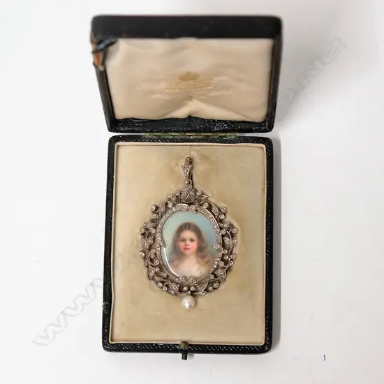 A quality 19thC gold diamond and pearl framed hand painted portrait locket