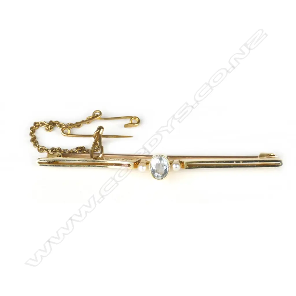 A c.1900 15ct. yellow gold aquamarine and seed pearl bar brooch Image 1++
