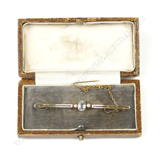A c.1900 15ct. yellow gold aquamarine and seed pearl bar brooch