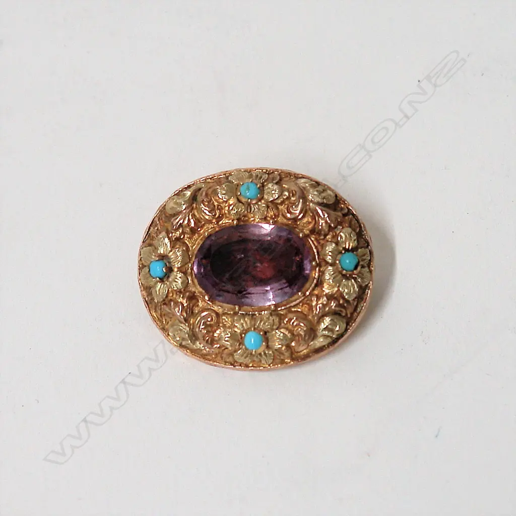 A 19thC 9ct. yellow gold amethyst and turquoise decorative brooch Image 1++