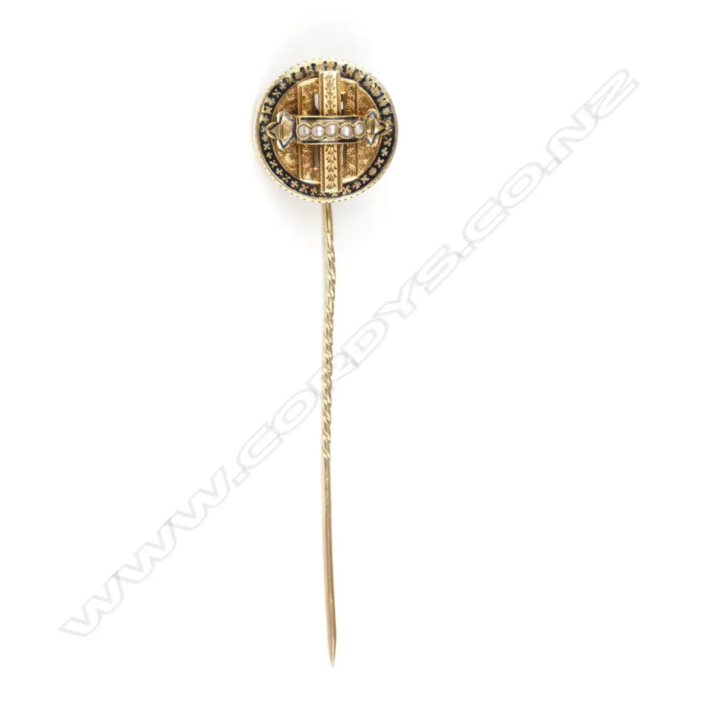 An early 20thC 9ct. gold and seed pearl fancy stick pin Image 1++