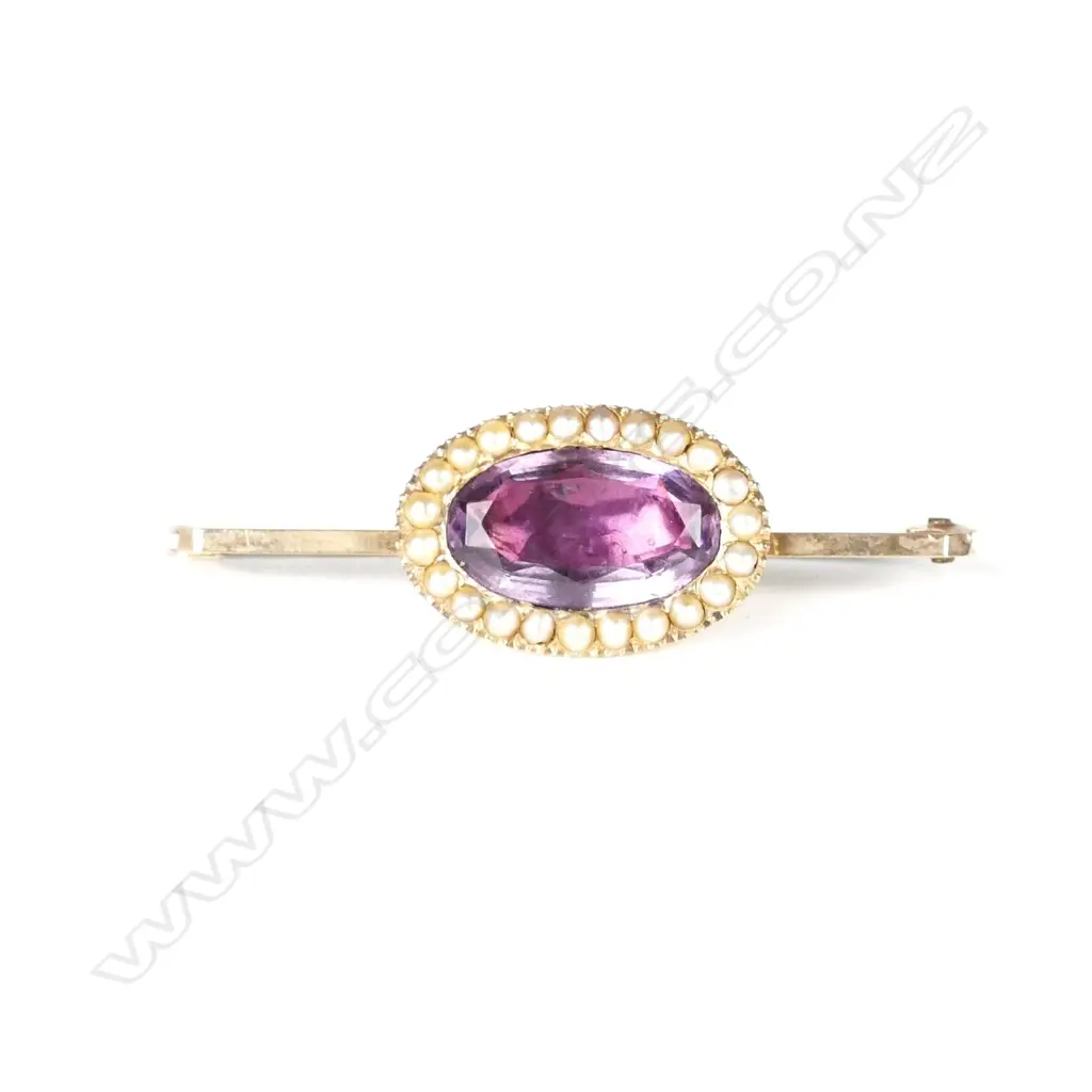 An antique 9ct. rose gold amethyst and seed pearl brooch Image 1++