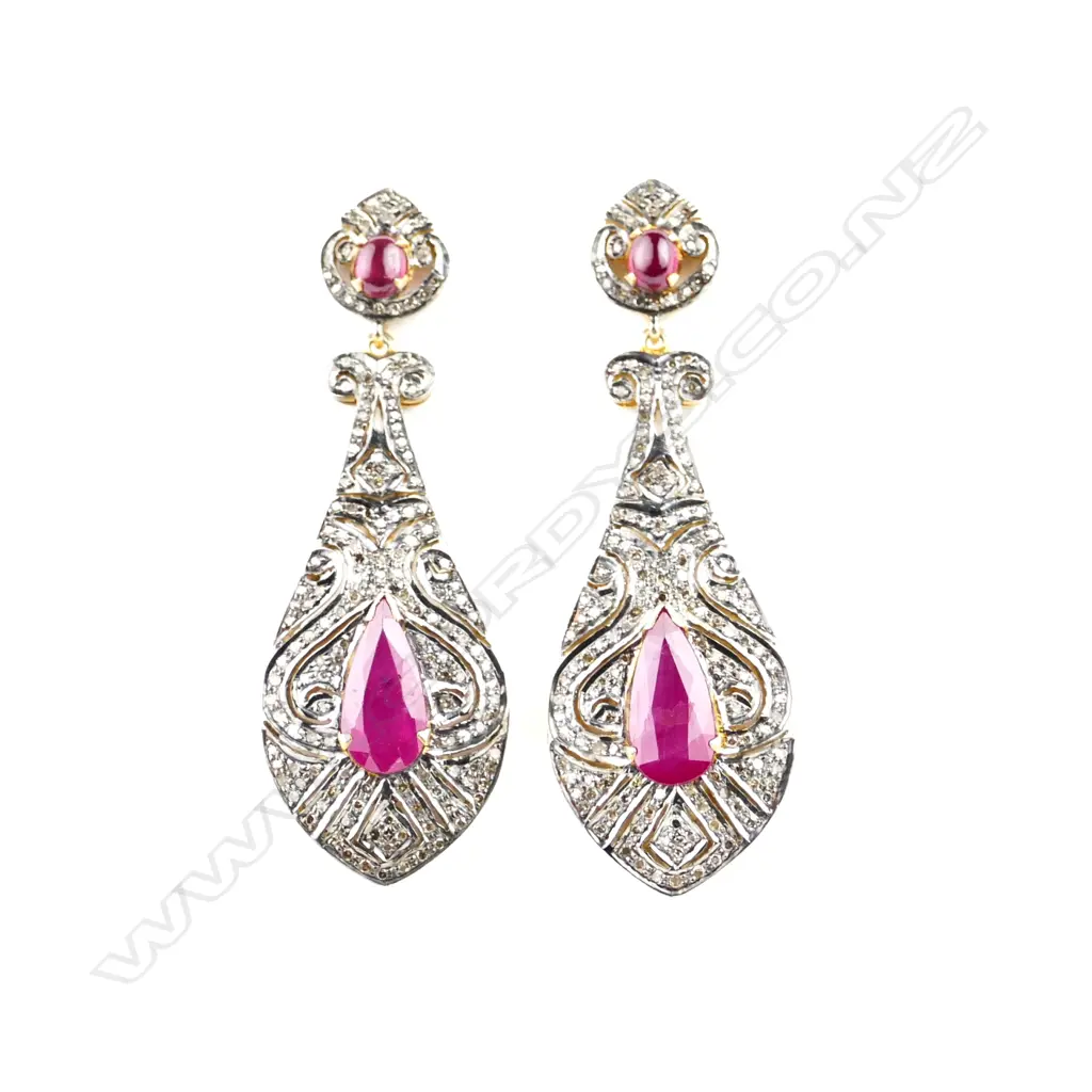 A pair of 14ct. and silver ruby and diamond drop earrings Image 1++