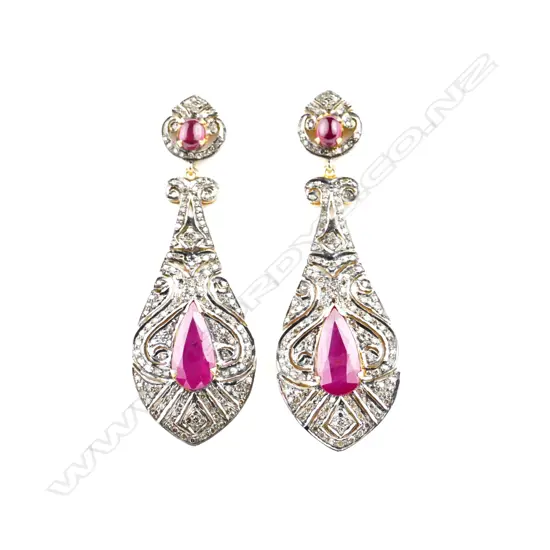 A pair of 14ct. and silver ruby and diamond drop earrings