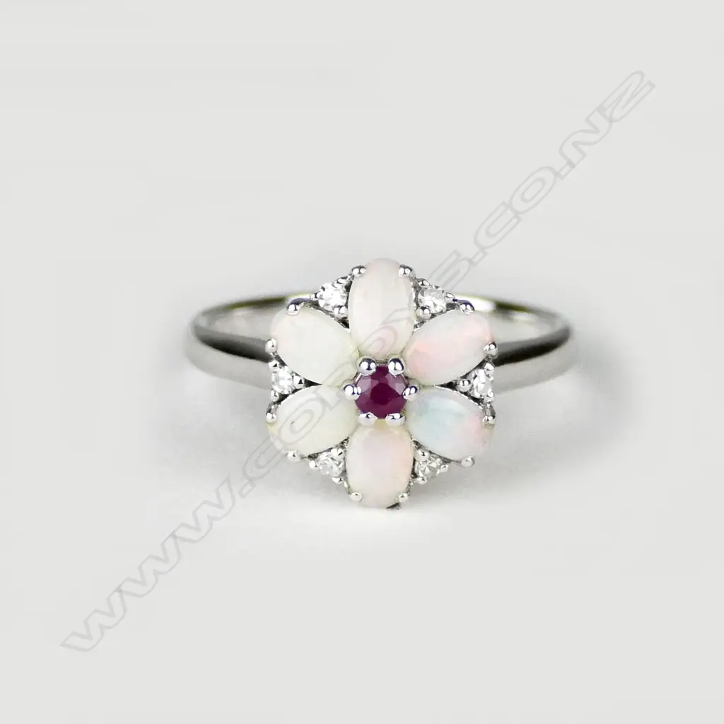 An 18ct. white gold opal ruby and diamond ring Image 1++