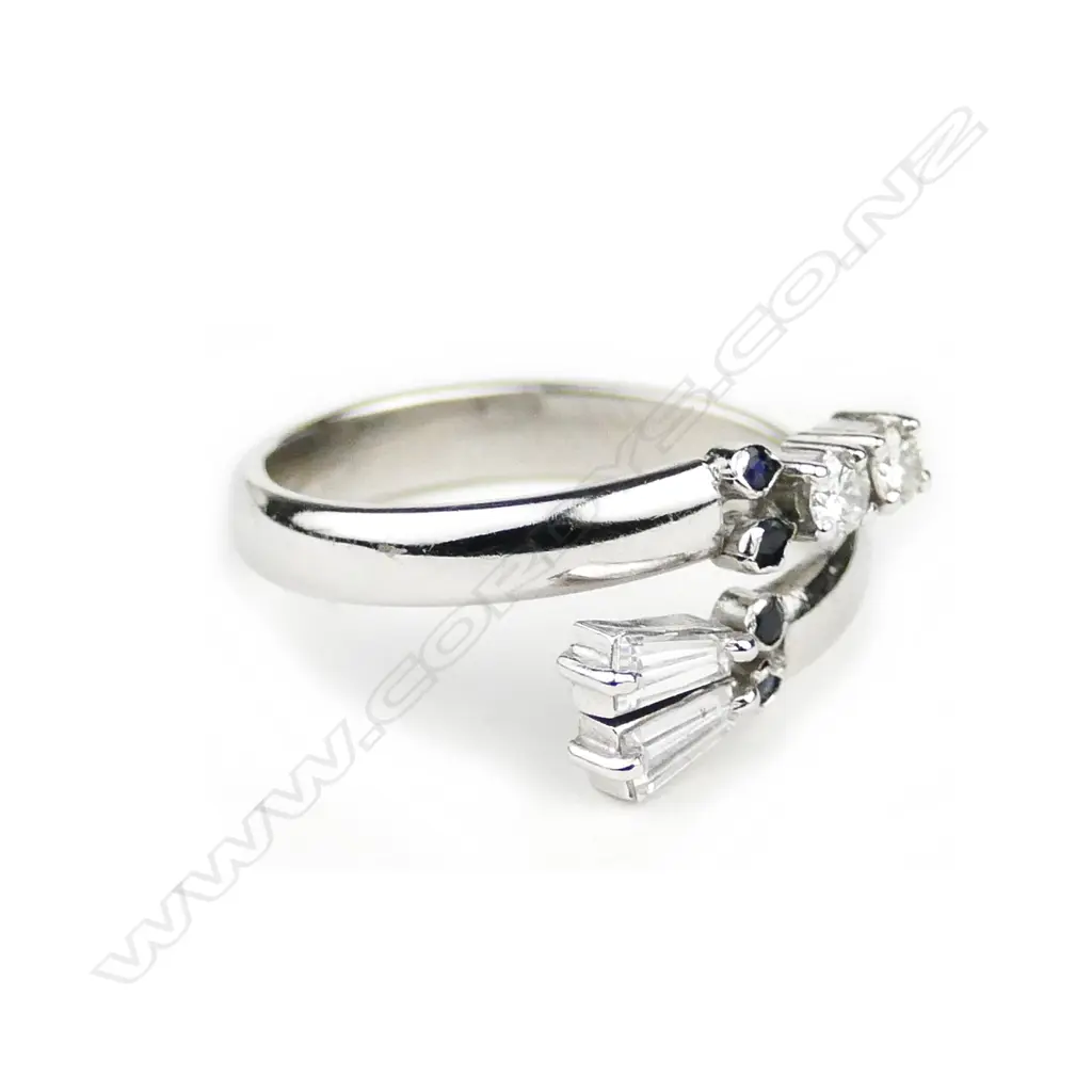 An 18ct. white gold and diamond ring Image 1++