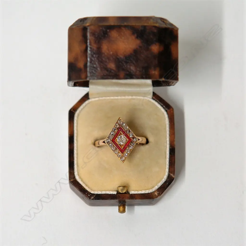 An Art Deco diamond and red enamel stylish ring Image 1++