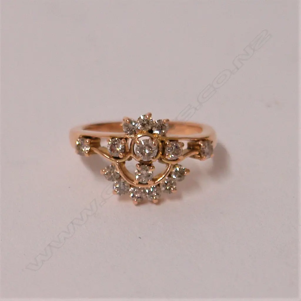 An early 20thC 18ct. yellow gold and diamond cluster ring Image 1++