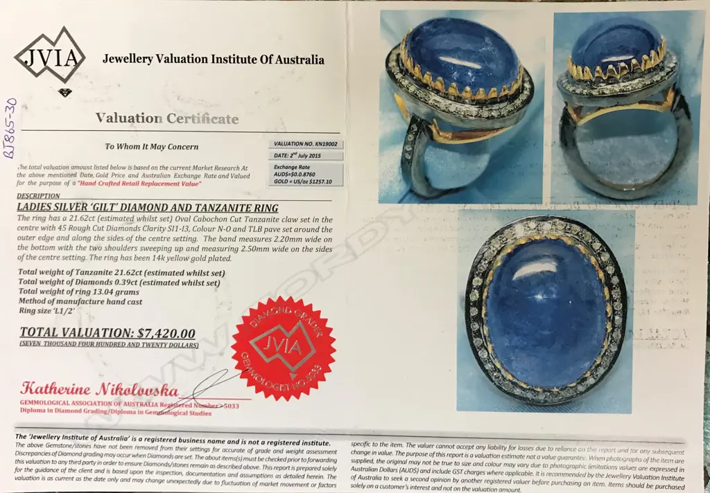 An impressive 14ct. yellow gold and silver tanzanite and diamond dress ring Image 1++