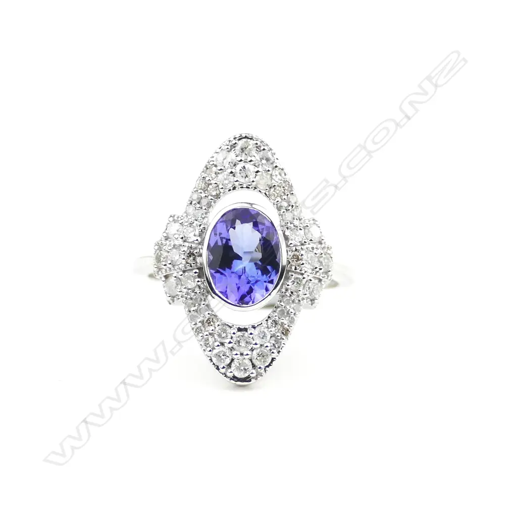 An 18ct white gold tanzanite and diamond ring Image 1++