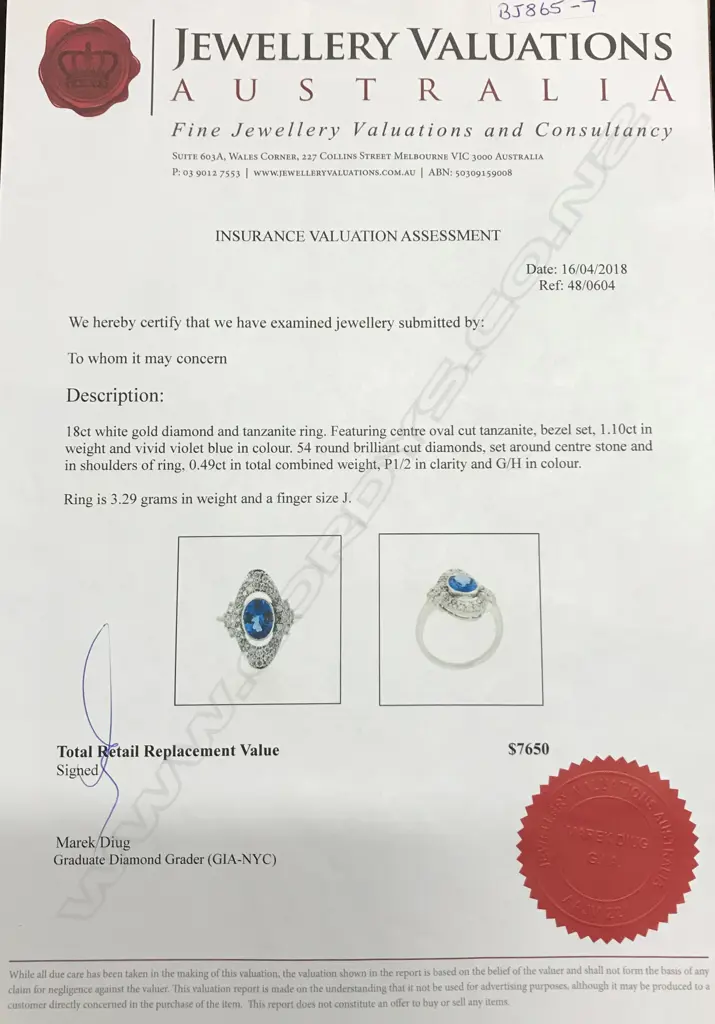 An 18ct white gold tanzanite and diamond ring Image 1++