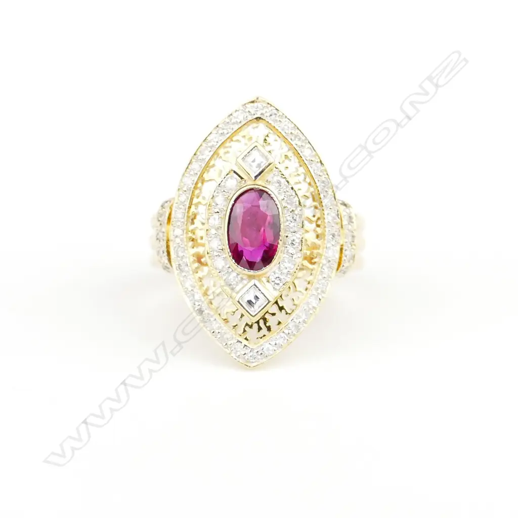 An 18ct. gold ruby and diamond dress ring Image 1++