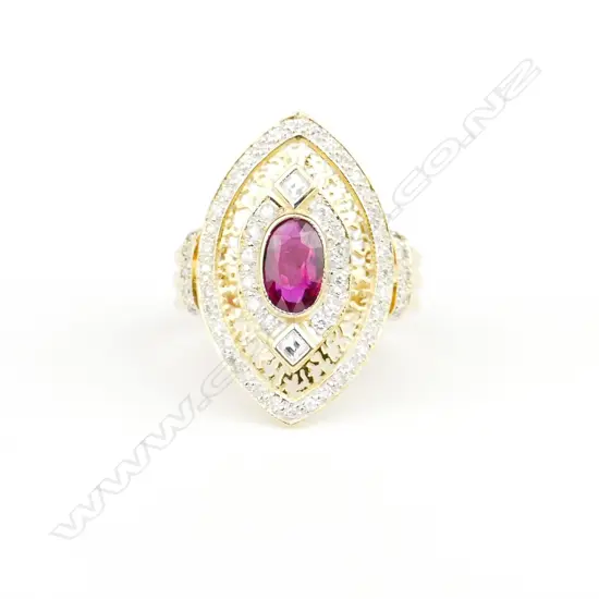 An 18ct. gold ruby and diamond dress ring