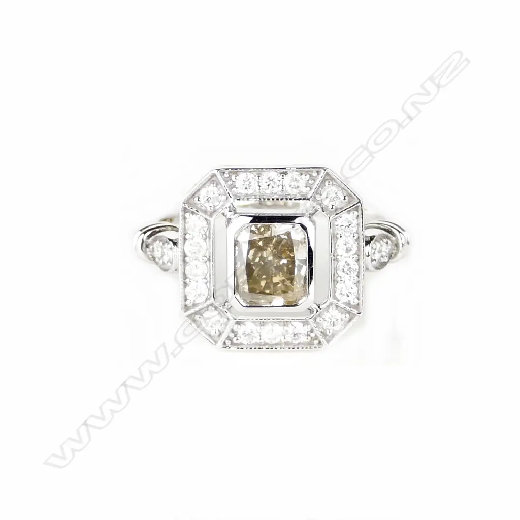 A 14ct. white gold diamond ring Image 1++