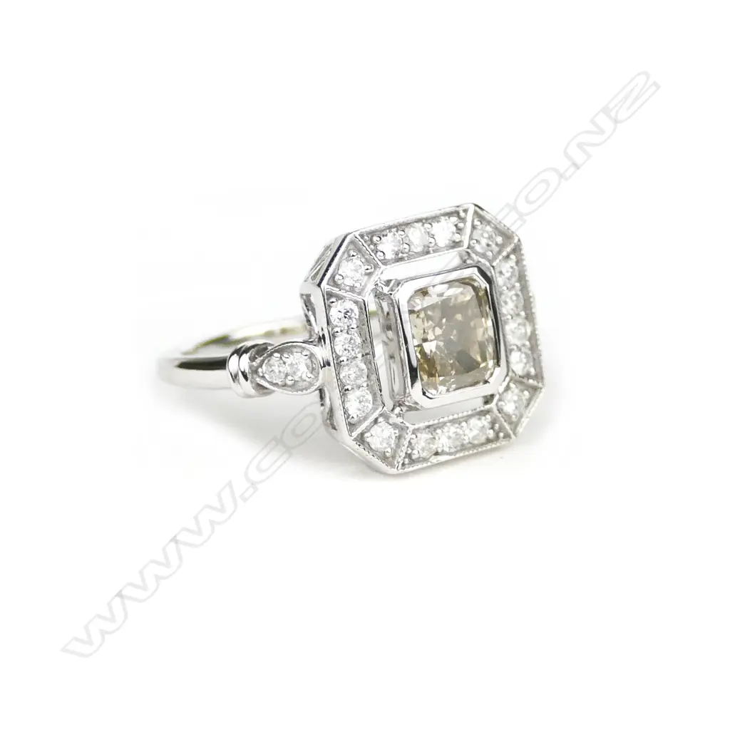 A 14ct. white gold diamond ring Image 1++