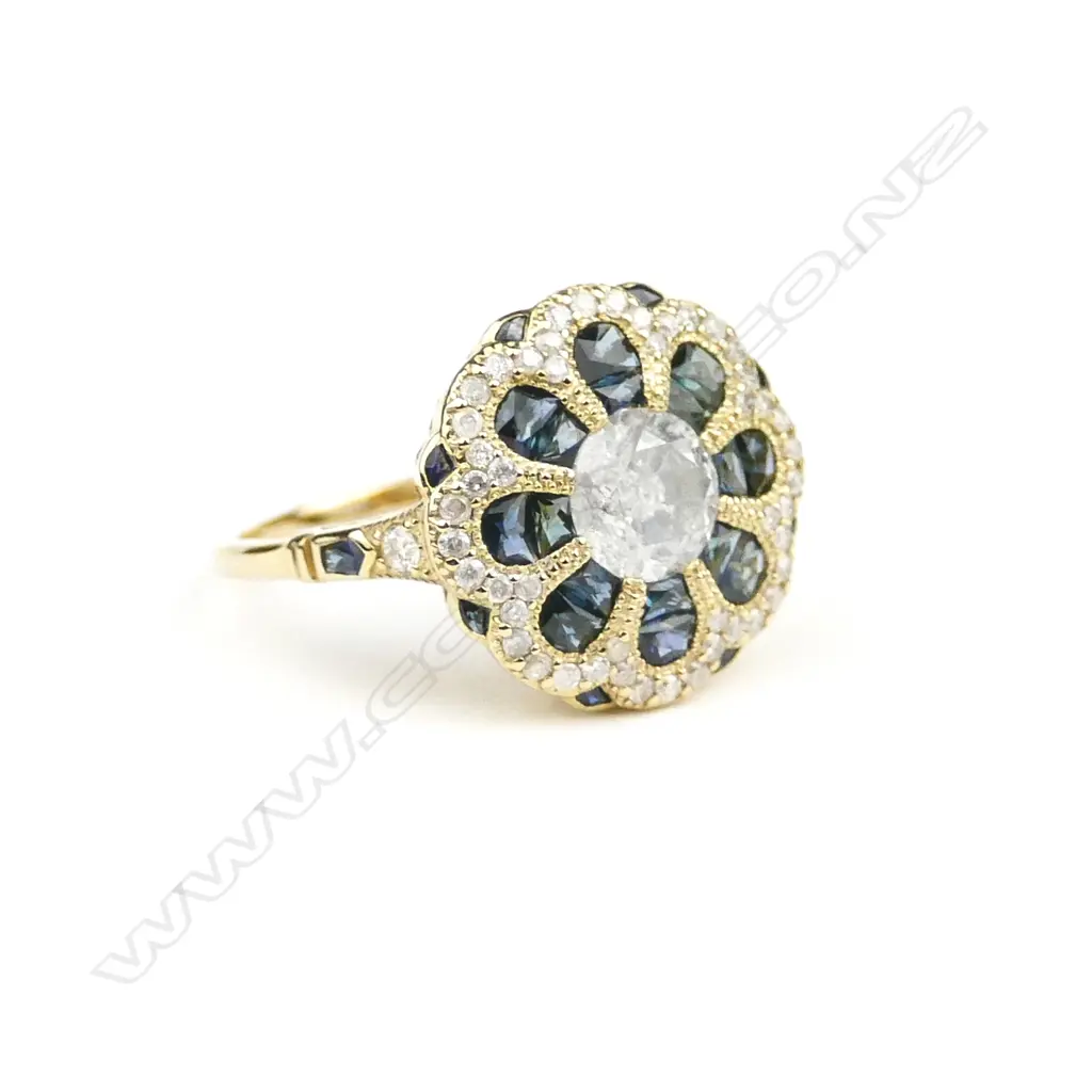A 14ct. gold sapphire and diamond ring Image 1++