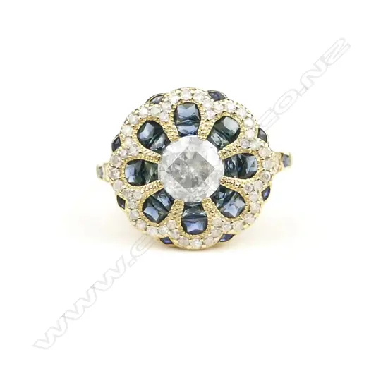 A 14ct. gold sapphire and diamond ring