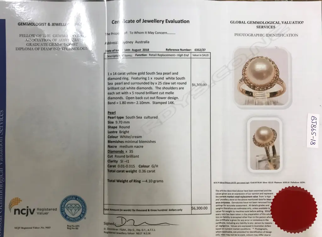A 14ct. gold pearl and diamond ring Image 1++