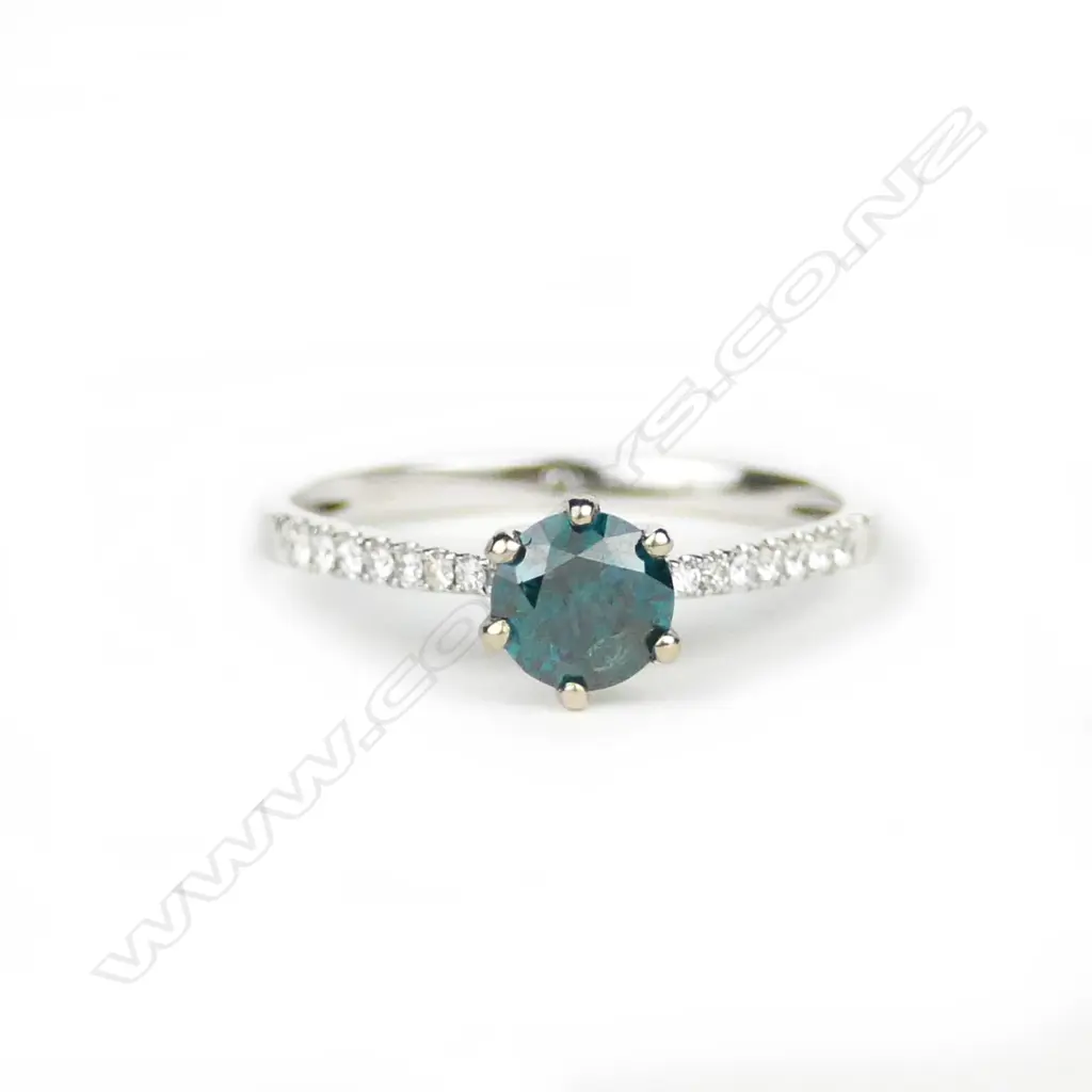A 14ct. white gold and diamond ring Image 1++