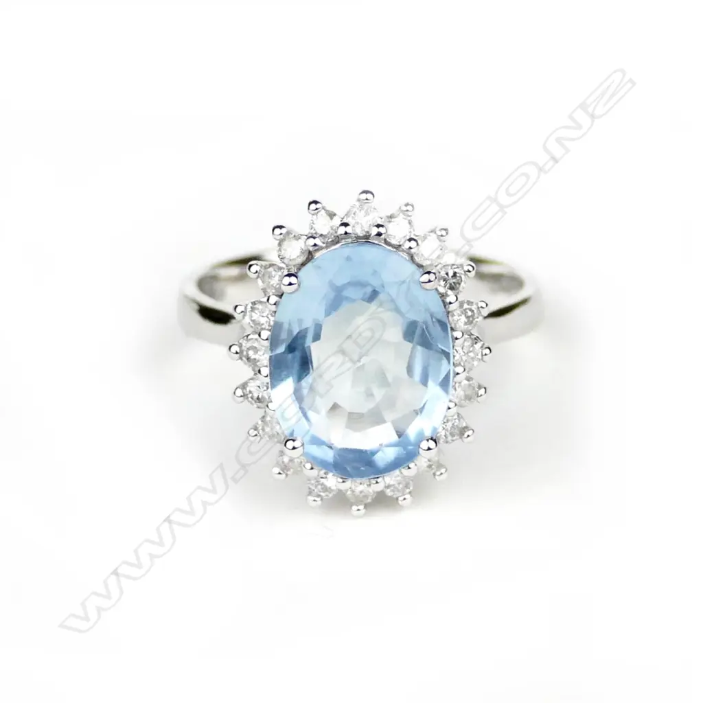 A 14ct. white gold aquamarine and diamond ring Image 1++
