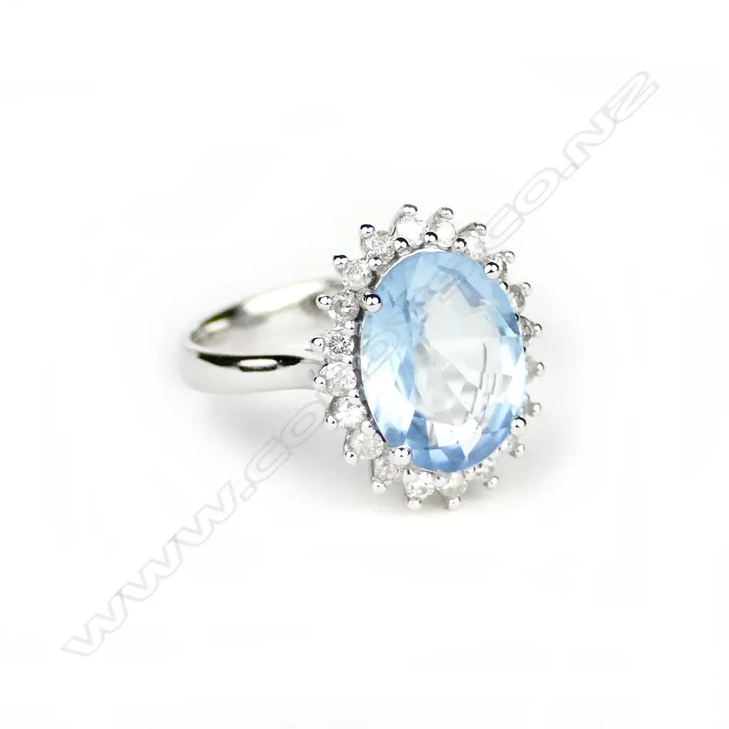 A 14ct. white gold aquamarine and diamond ring Image 1++