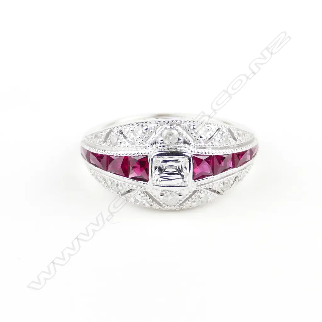An 18ct. white gold ruby and diamond ring Image 1++