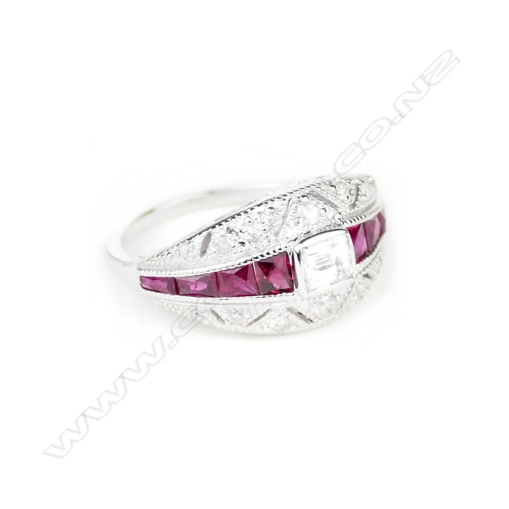 An 18ct. white gold ruby and diamond ring Image 1++
