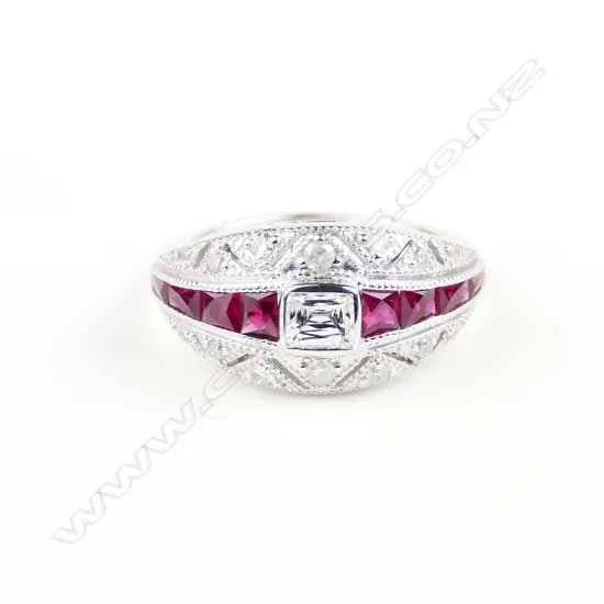 An 18ct. white gold ruby and diamond ring