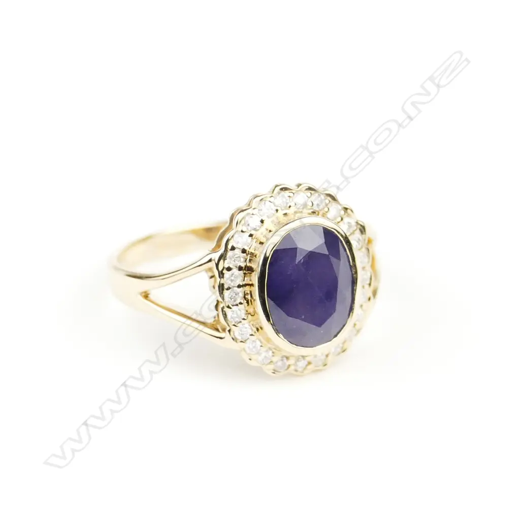 A 14ct. gold sapphire and diamond ring Image 1++